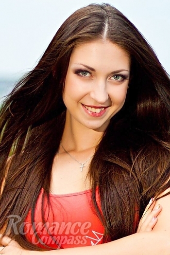 Ukrainian mail order bride Lyubov from Nikolaev with light brown hair and green eye color - image 1