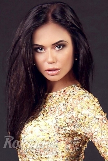 Ukrainian mail order bride Ksenia from Donetsk with black hair and grey eye color - image 1