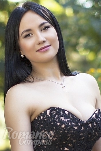 Ukrainian mail order bride Anna from Odessa with black hair and brown eye color - image 1
