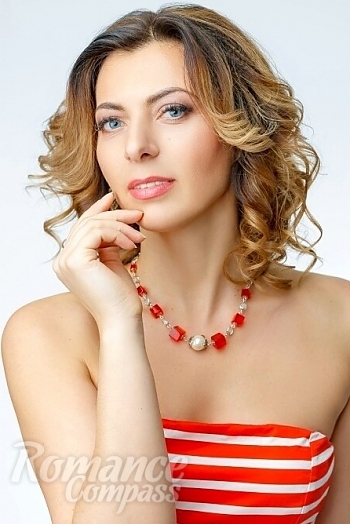 Ukrainian mail order bride Zoia from Dnipro with light brown hair and blue eye color - image 1