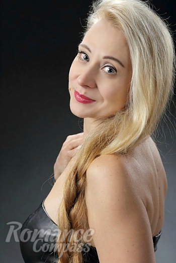 Ukrainian mail order bride Lyudmila from Kyiv with blonde hair and grey eye color - image 1