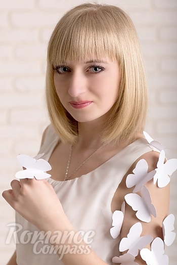 Ukrainian mail order bride Julia from Nikolaev with blonde hair and blue eye color - image 1