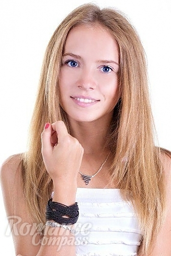 Ukrainian mail order bride Oksana from Moscow with light brown hair and blue eye color - image 1