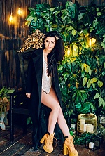 Ukrainian mail order bride Polina from Poltava with black hair and green eye color - image 4