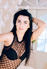 Ukrainian mail order bride Polina from Poltava with black hair and green eye color - image 2