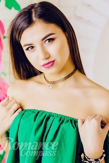 Ukrainian mail order bride Daria from Poltava with black hair and brown eye color - image 1