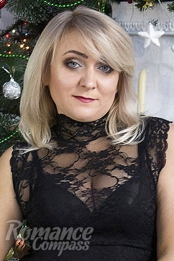 Ukrainian mail order bride Natalia from Gorlovka with white grey hair and blue eye color - image 1