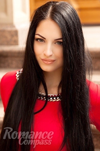Ukrainian mail order bride Viktoria from Kiev with black hair and green eye color - image 1