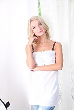 Ukrainian mail order bride Olga from Kiev with blonde hair and blue eye color - image 4