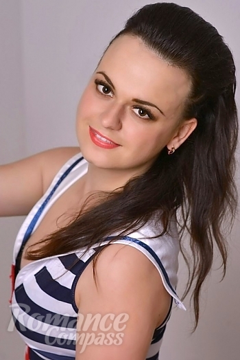 Ukrainian mail order bride Oksana from Kiev with black hair and brown eye color - image 1