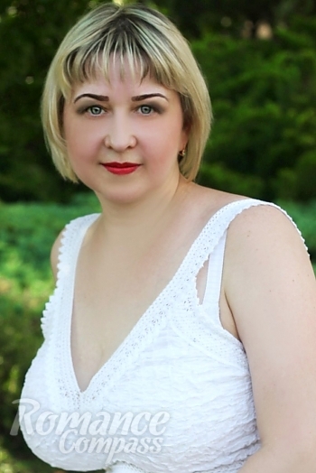 Ukrainian mail order bride Marina from Lugansk with blonde hair and grey eye color - image 1