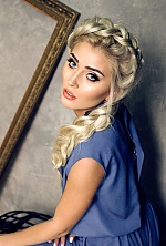 Ukrainian mail order bride Anastasia from Kiev with blonde hair and blue eye color - image 3