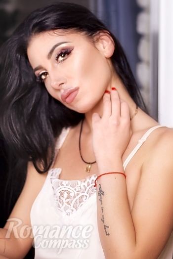 Ukrainian mail order bride Maria from Kharkiv with black hair and brown eye color - image 1