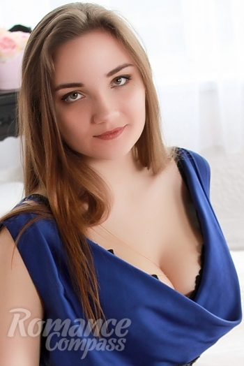 Ukrainian mail order bride Alena from Poltava with light brown hair and blue eye color - image 1