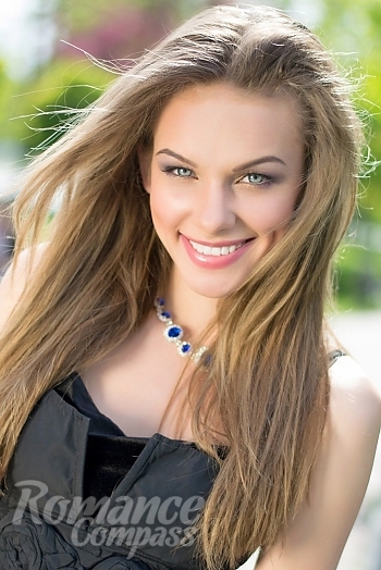 Ukrainian mail order bride Tatyana from Kharkiv with light brown hair and blue eye color - image 1