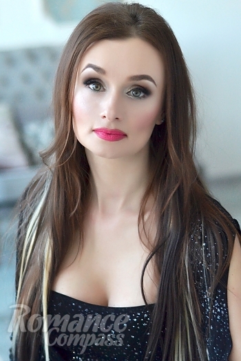 Ukrainian mail order bride Anna from Odessa with light brown hair and green eye color - image 1