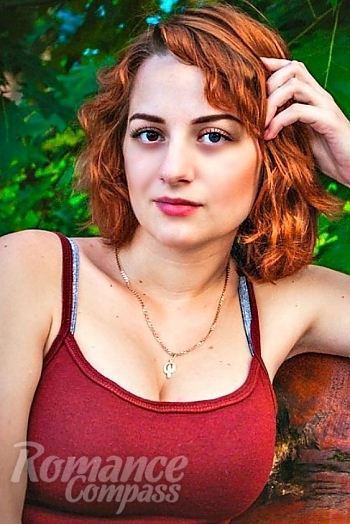 Ukrainian mail order bride Yulia from Cherkassy with red hair and blue eye color - image 1
