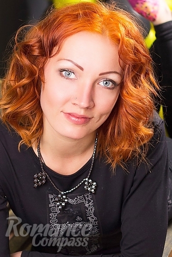 Ukrainian mail order bride Olga from Lisichansk with red hair and blue eye color - image 1