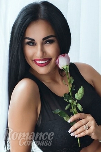 Ukrainian mail order bride Svetlana from Sumy with black hair and grey eye color - image 1