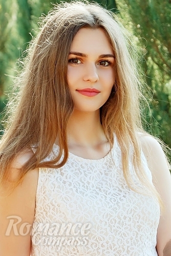 Ukrainian mail order bride Victoria from Kharkiv with light brown hair and brown eye color - image 1