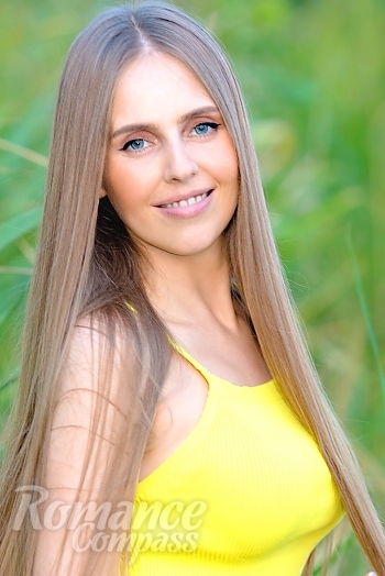 Ukrainian mail order bride Natalia from Nikolaev with blonde hair and blue eye color - image 1