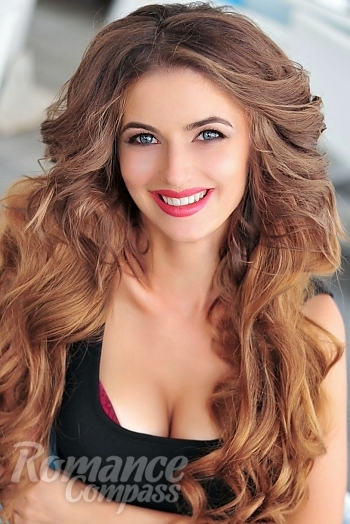 Ukrainian mail order bride Yulia from Odessa with light brown hair and blue eye color - image 1