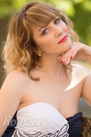 Ukrainian mail order bride Olga from Lugansk with light brown hair and hazel eye color - image 1