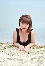 Ukrainian mail order bride Lesya from Kherson with light brown hair and green eye color - image 13