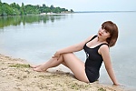 Ukrainian mail order bride Lesya from Kherson with light brown hair and green eye color - image 11