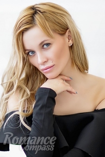 Ukrainian mail order bride Veronika from Kiev with blonde hair and blue eye color - image 1