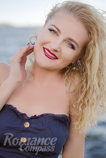 Ukrainian mail order bride Katerina from Nikopol with blonde hair and green eye color - image 1