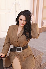Ukrainian mail order bride Diana from Kyiv with black hair and hazel eye color - image 14