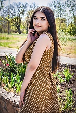 Ukrainian mail order bride Roksana from Berdyansk with black hair and green eye color - image 11