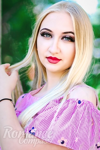 Ukrainian mail order bride Svetlana from Nikolaev with blonde hair and blue eye color - image 1