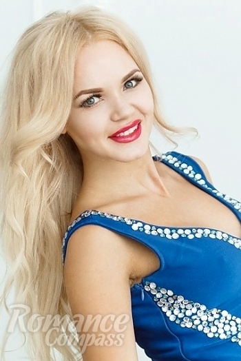 Ukrainian mail order bride Olga from Moscow with blonde hair and blue eye color - image 1