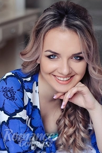 Ukrainian mail order bride Valentina from Odessa with light brown hair and blue eye color - image 1