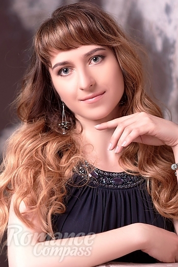 Ukrainian mail order bride Tatyana from Kharkov with light brown hair and blue eye color - image 1