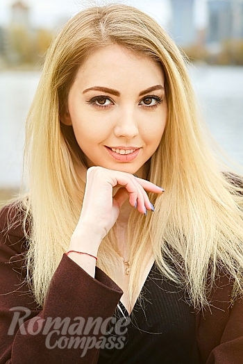 Ukrainian mail order bride Anna from Kyiv with blonde hair and hazel eye color - image 1