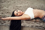 Ukrainian mail order bride Larisa from Odessa with black hair and green eye color - image 5