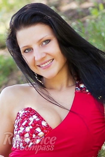Ukrainian mail order bride Larisa from Odessa with black hair and green eye color - image 1