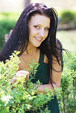 Ukrainian mail order bride Larisa from Odessa with black hair and green eye color - image 9