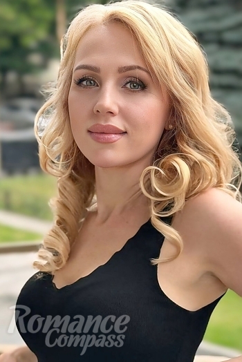 Ukrainian mail order bride Tatiana from Dnipro with blonde hair and green eye color - image 1