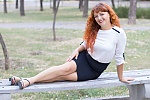 Ukrainian mail order bride Oksana from Nikolaev with red hair and green eye color - image 4