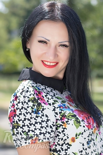 Ukrainian mail order bride Inna from Nikolaev with black hair and green eye color - image 1
