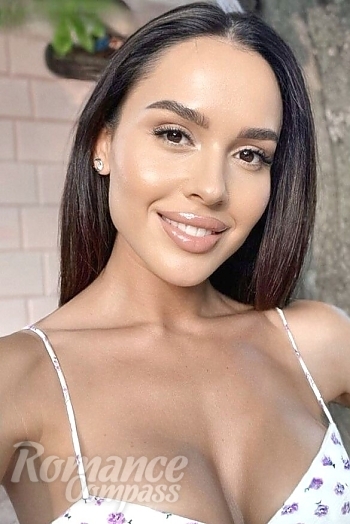 Ukrainian mail order bride Nina from Kiev with black hair and hazel eye color - image 1