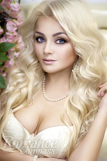 Ukrainian mail order bride Aleksandra from Lvov with blonde hair and blue eye color - image 1