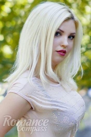 Ukrainian mail order bride Lilia from Luhansk with blonde hair and blue eye color - image 1