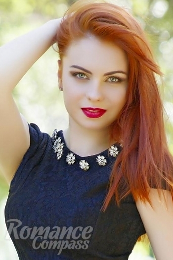 Ukrainian mail order bride Anastasia from Luhansk with red hair and grey eye color - image 1