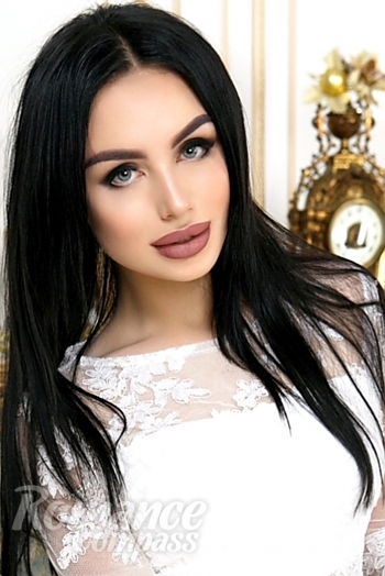 Ukrainian mail order bride Darina from Dnipro with black hair and blue eye color - image 1