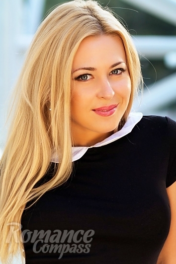 Ukrainian mail order bride Marina from Sumy with blonde hair and blue eye color - image 1